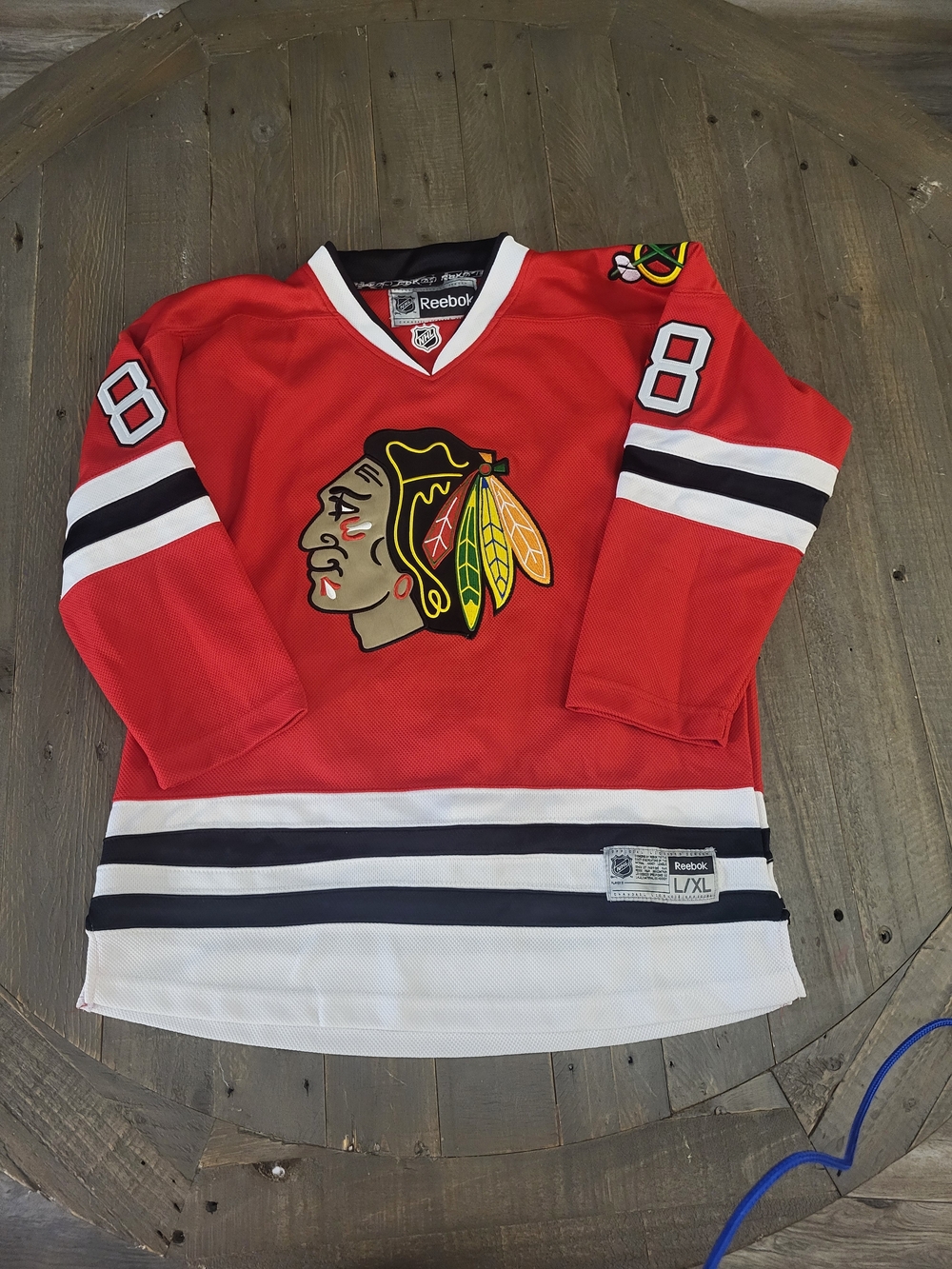 Reebok Kids Red Chicago Blackhawks Hockey Jersey with White and Black Stripes